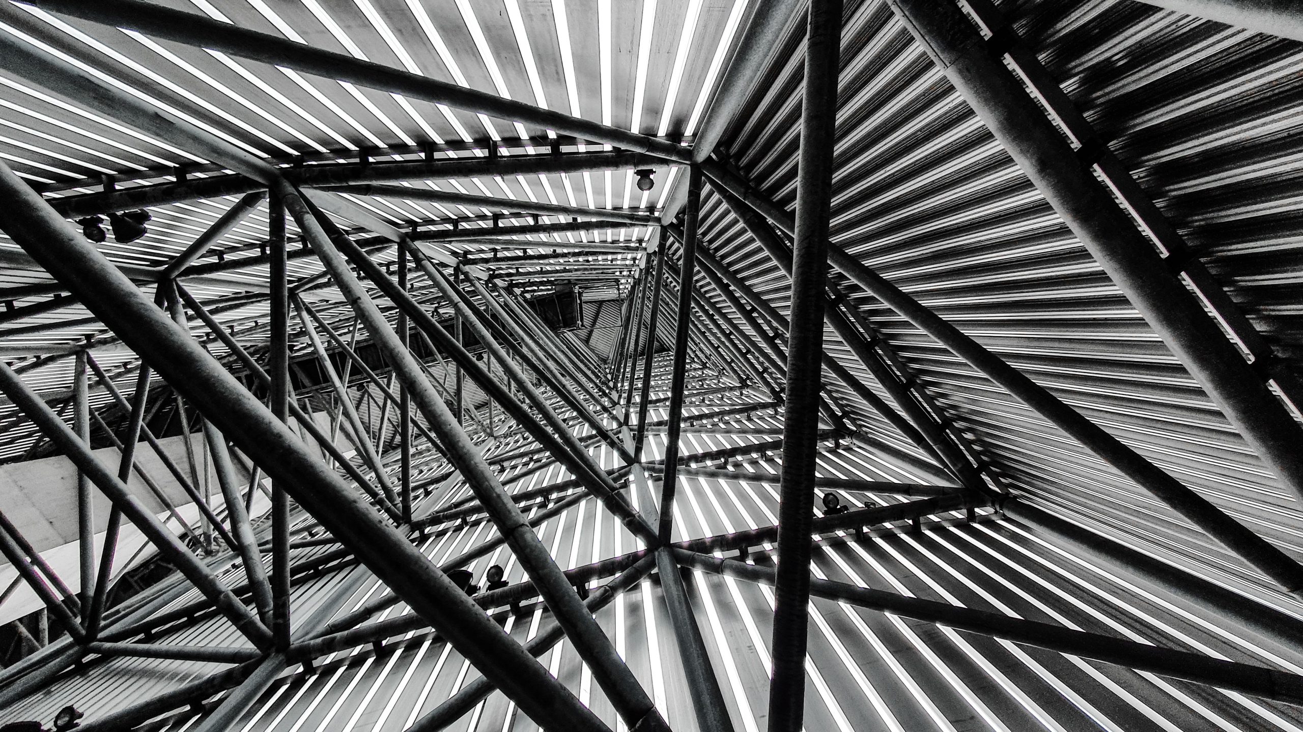 Modern steel frame building under construction - structural design using STAAD Pro for industrial and commercial structures